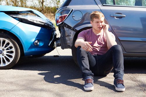Teen driver after car accident calling Baltimore car accident lawyer