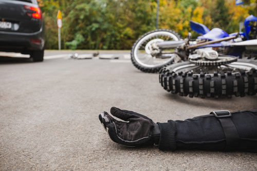 Motorcycle rider hit by car, concept of motorcycle accident lawyer in Laurel Maryland