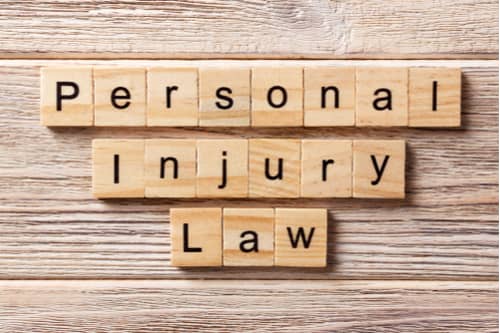 Blocks spelling personal injury law, concept of injury lawyer in Laurel Maryland